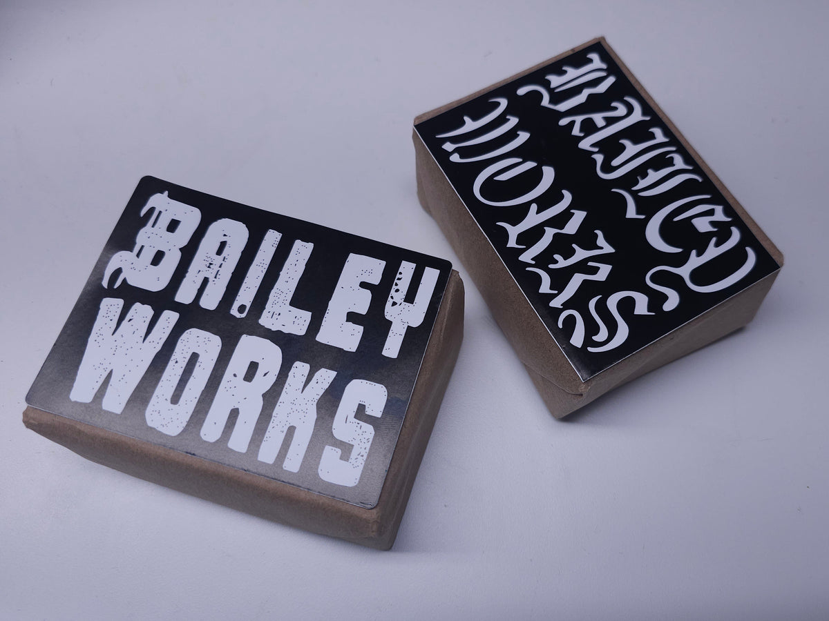 two sample stickers on display